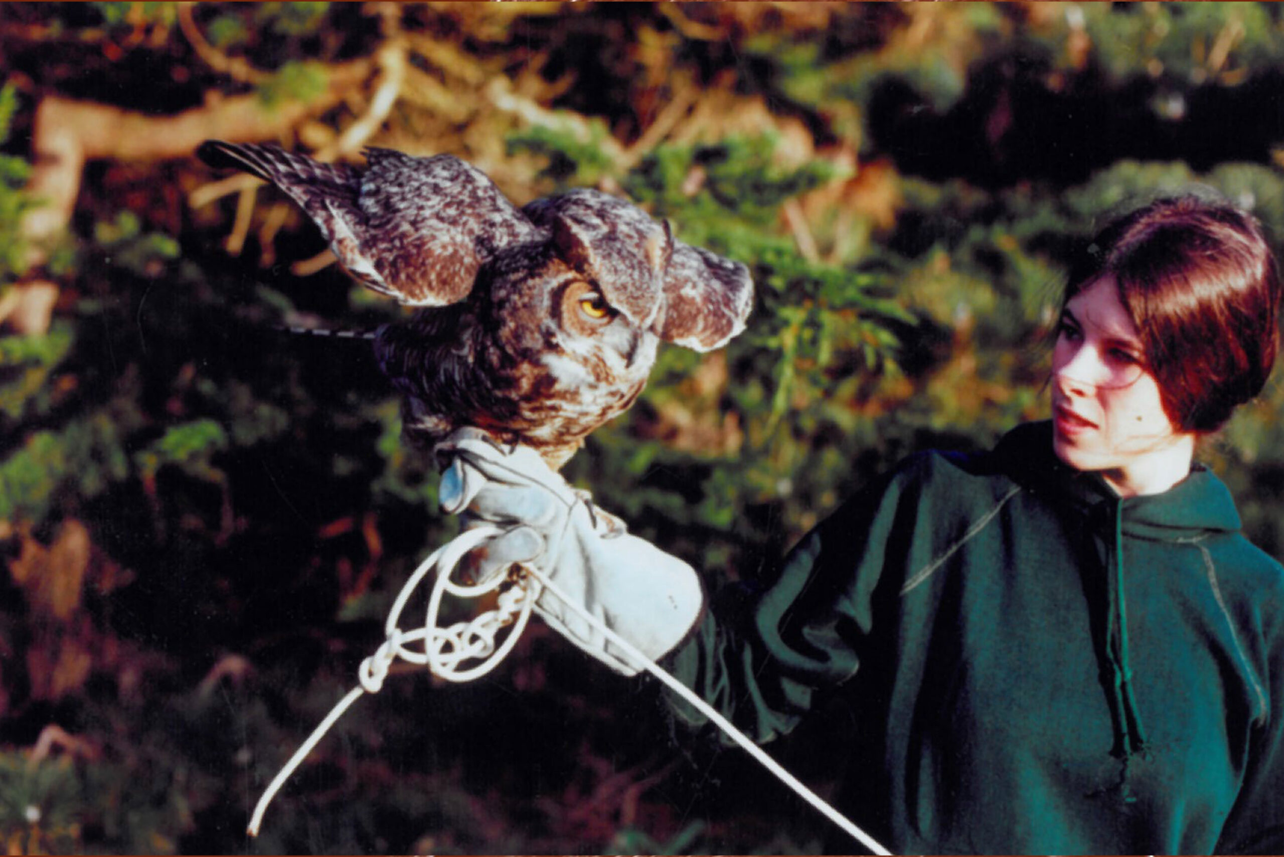 Nancy Lang with an owl when she was younger